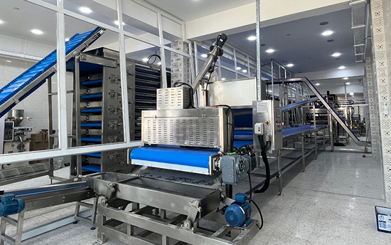 Linha de produção de marshmallows no Iraque